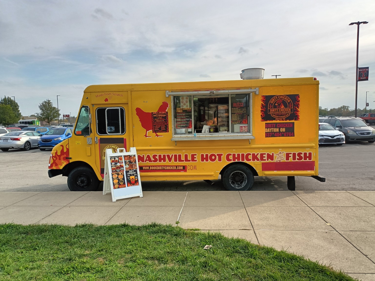 The yellow Dirty Chicken food truck